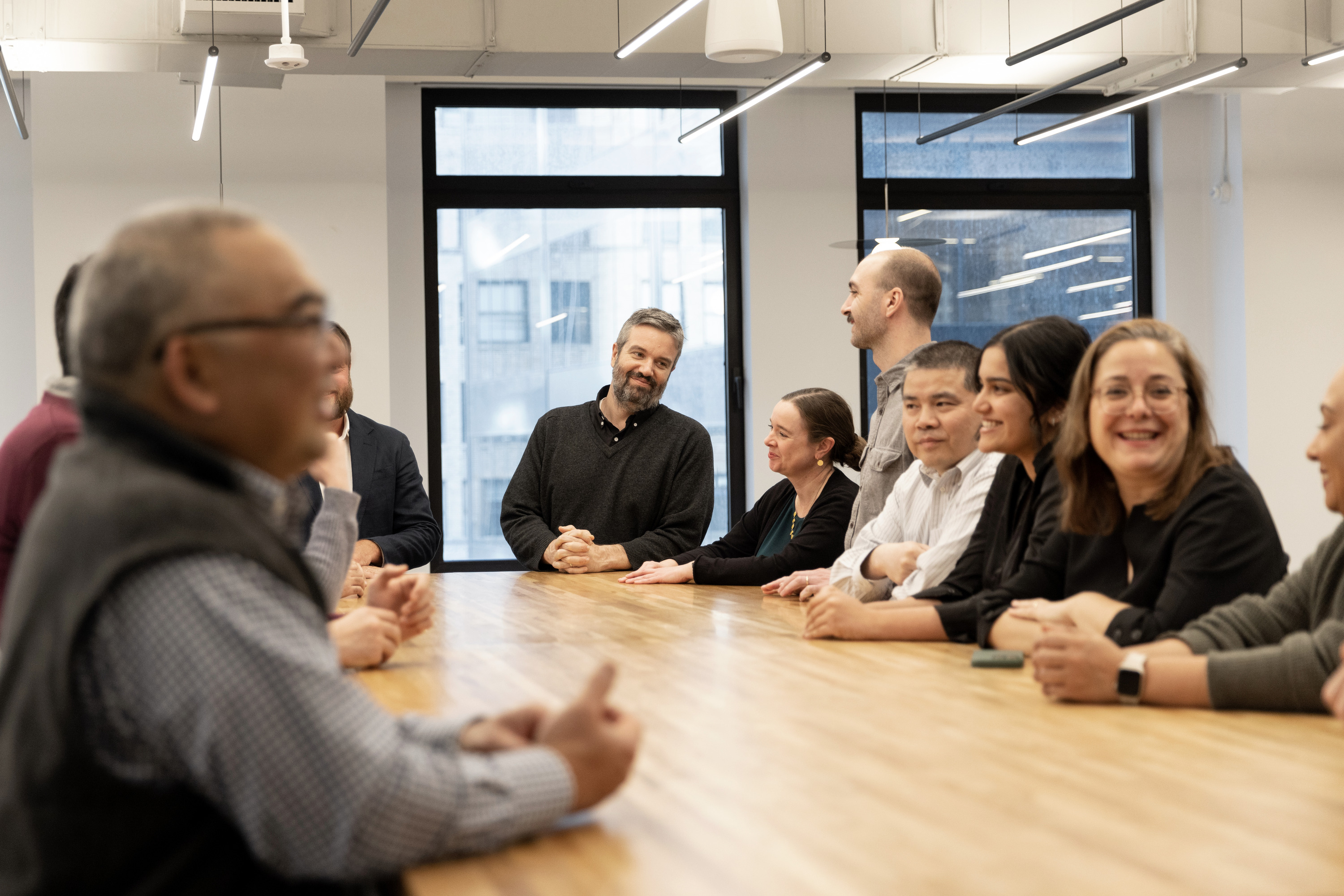 Members of Core studio meeting together.