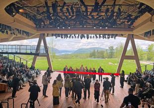 The 451-seat, open-air theater is the focal point of the company’s 98-acre arts complex and is defined by a dramatic mass-timber roof inspired by the shape of a bird’s wing. 