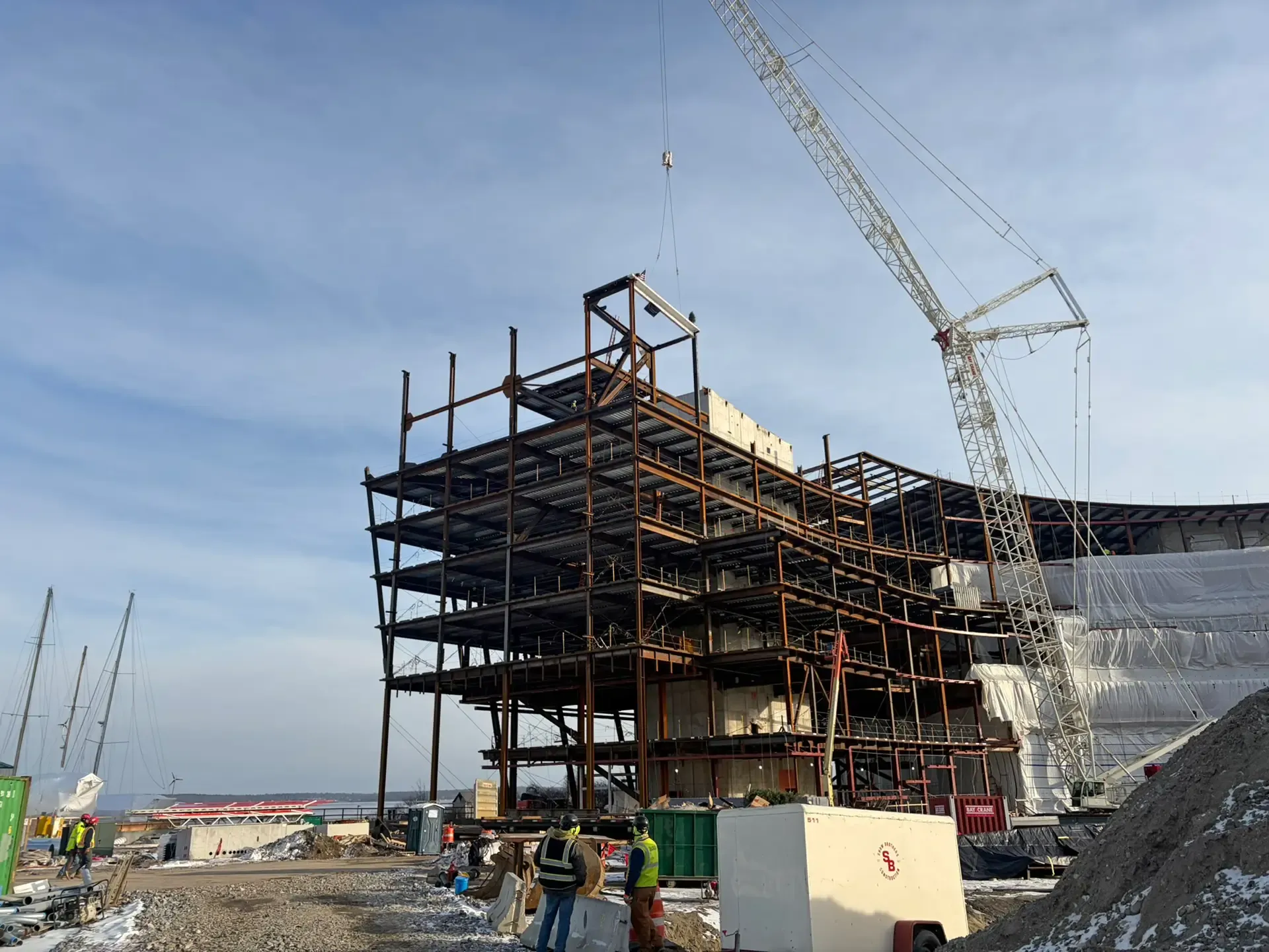 Designed for a changing climate, all critical systems are elevated above projected future flood levels, enhancing resilience, durability and long-term operational continuity. The building is scheduled to open in spring 2028.