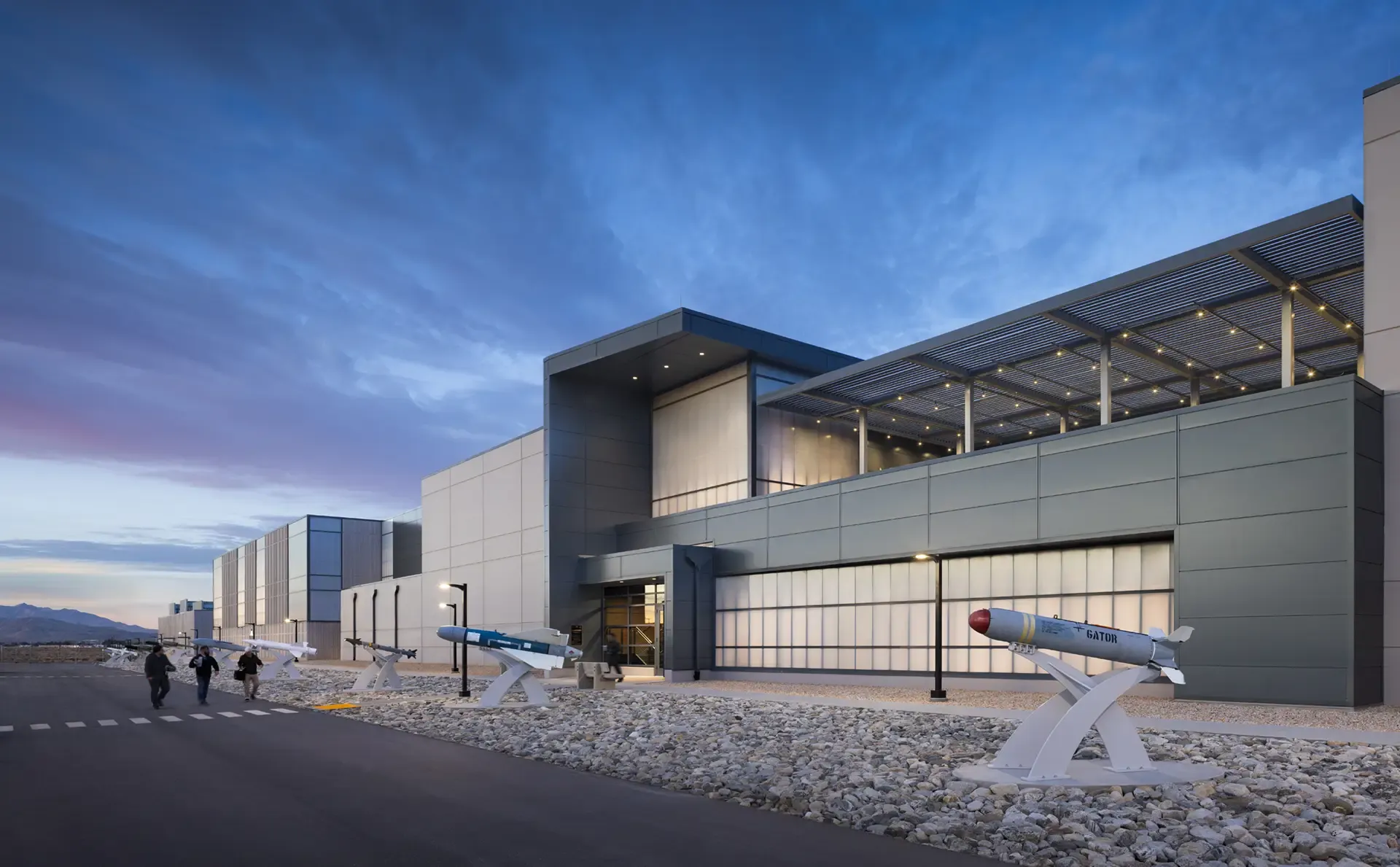 Our forensic consultants studied earthquake damage, protective design and security specialists helped the team weave antiterrorism and blast‑resistant features into the new buildings, and construction engineers worked with the steel contractor to make long‑span hangars constructible in a remote desert setting. 