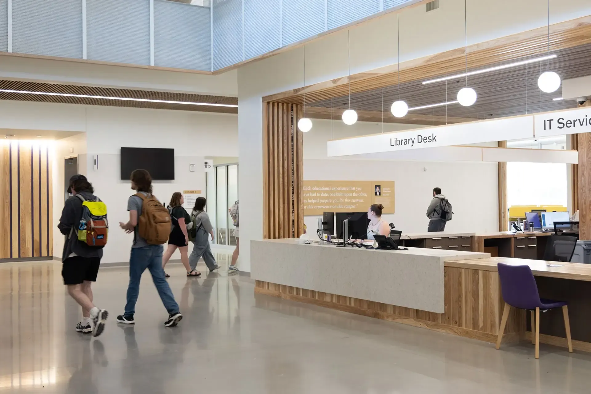 We then provided structural design and façade peer review services for the four-story replacement facility, which now serves as the campus' principal library.