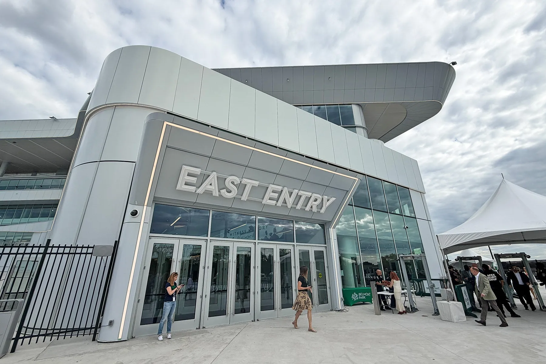 The project team reused portions of the 1960s building’s foundations to reduce demolition and environmental impacts, and the smaller building footprint supports the park’s role as a community and racing hub while respecting its historical significance.
