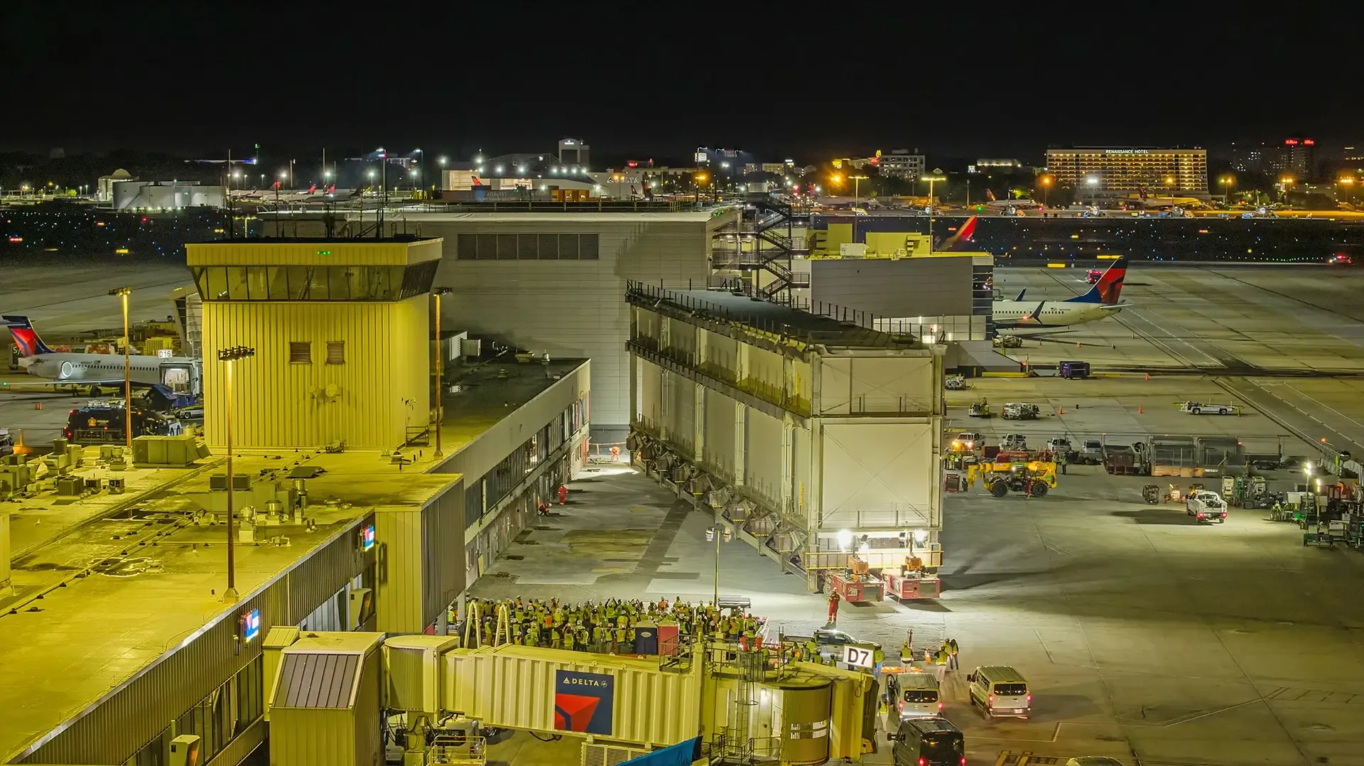 Work then shifted to the west side, where sections of the extension will span the existing structure and connect to the modules on the opposite side. 